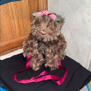 Clea Bear toy has ribbons your child can tie very huggable cute companion